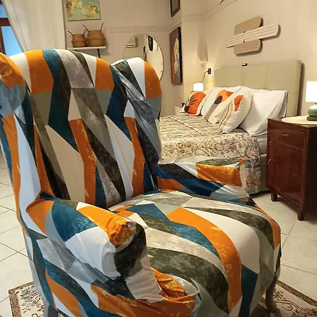 Δωμάτια σε οικογενειακή κατοικία Sa Domu De Efisia